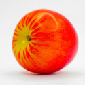 Świeczka w kształcie owocu, czerwone jabłko, w opakowaniu